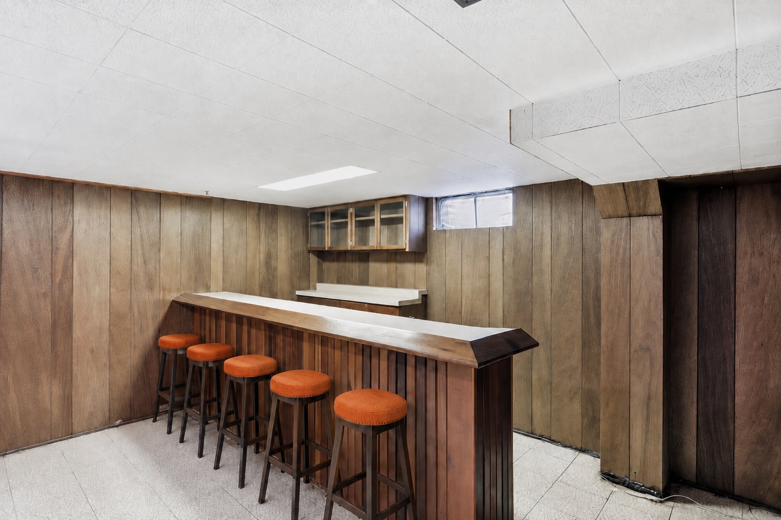 Bar area virtually staged with bar stools