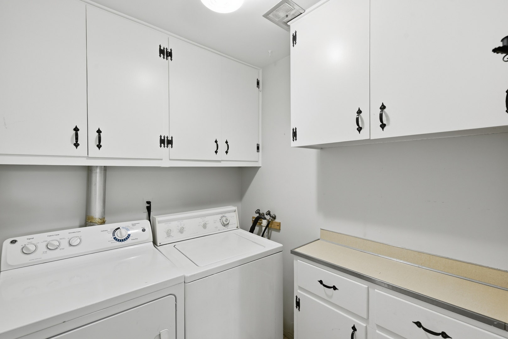 A full-size laundry room right off the kitchen