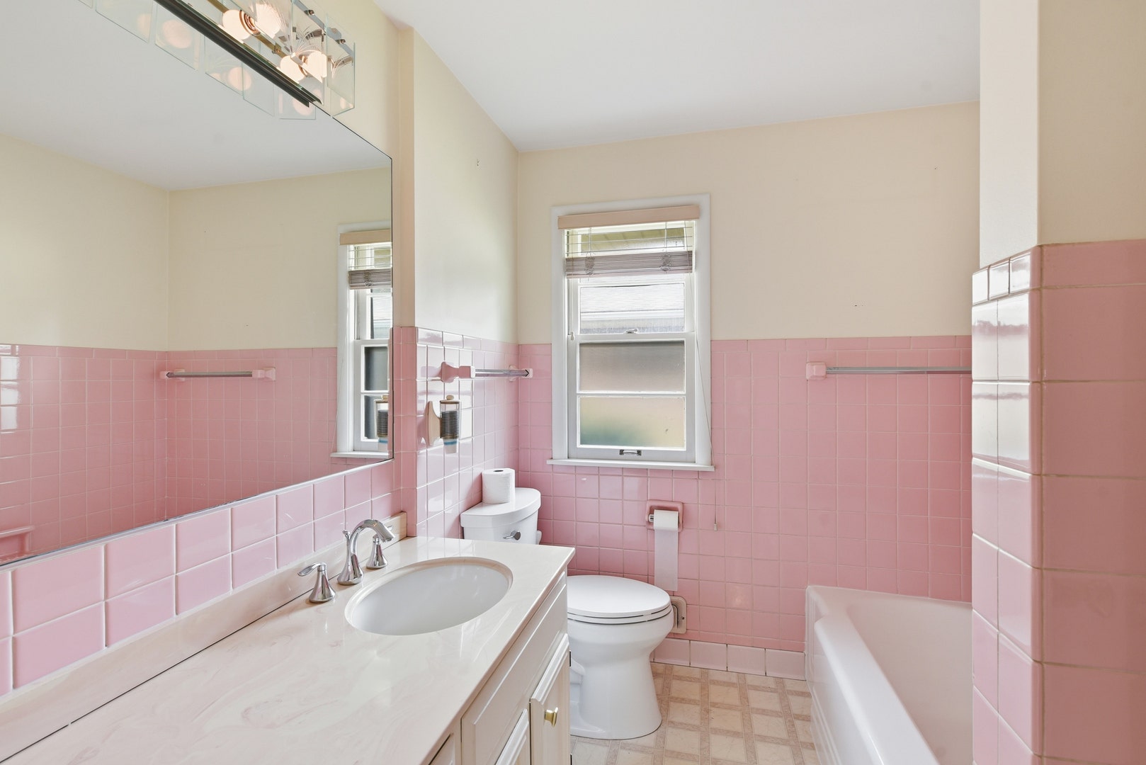 Second full bathroom with the tub- retro style.