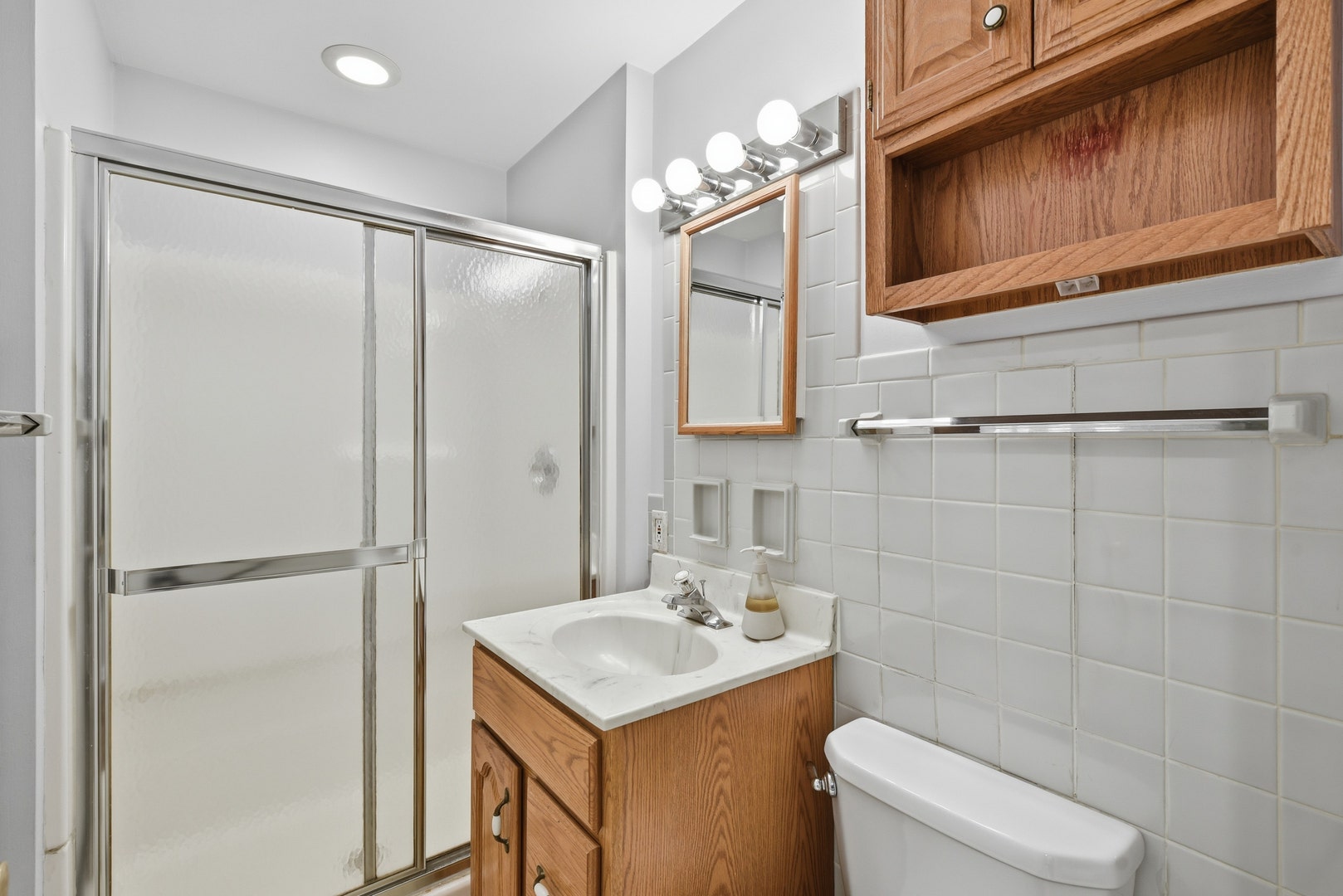 Main floor first full bathroom with the shower