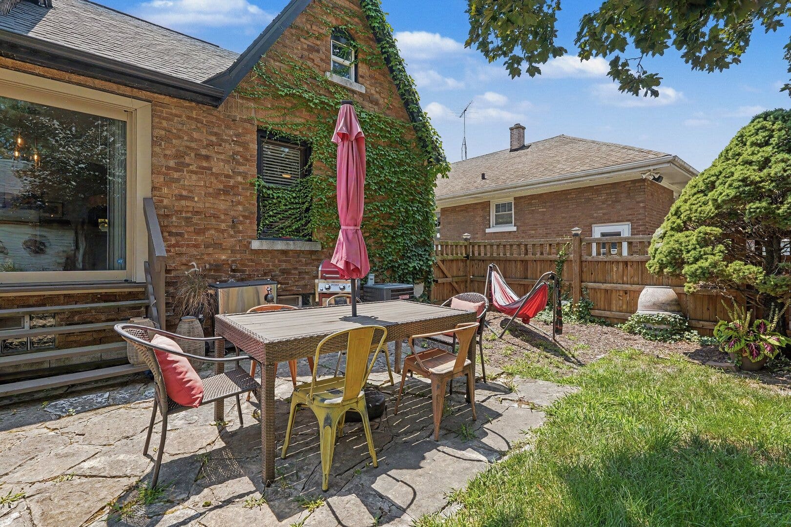1009 John Street, Joliet, IL 60435 Backyard patio & fenced yard 2020