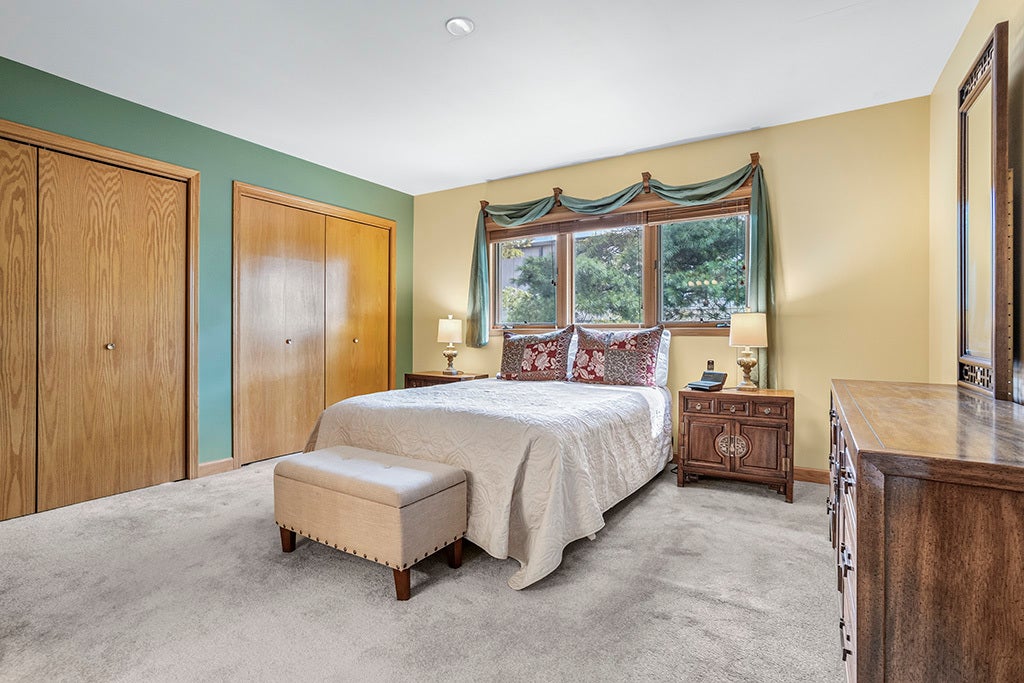MASTER BEDROOM HAS FRENCH DOOR ENTRY, HIS-N-HER CL