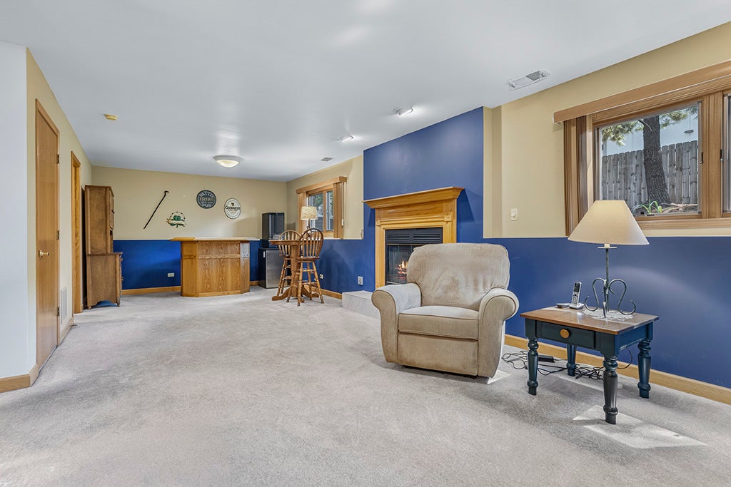 LOWER LEVEL FAMILY RM W/FIREPLACE, A 3/4 BATH & LO
