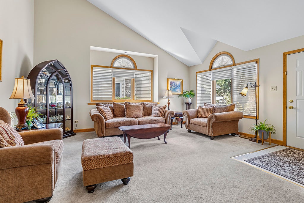 LIVING ROOM WITH VAULTED CEILINGS