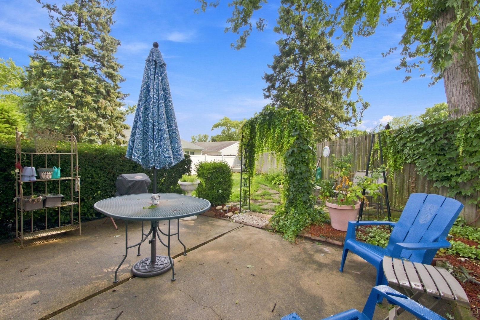 Large Cement Patio Overlooking Fully Fenced Back Y