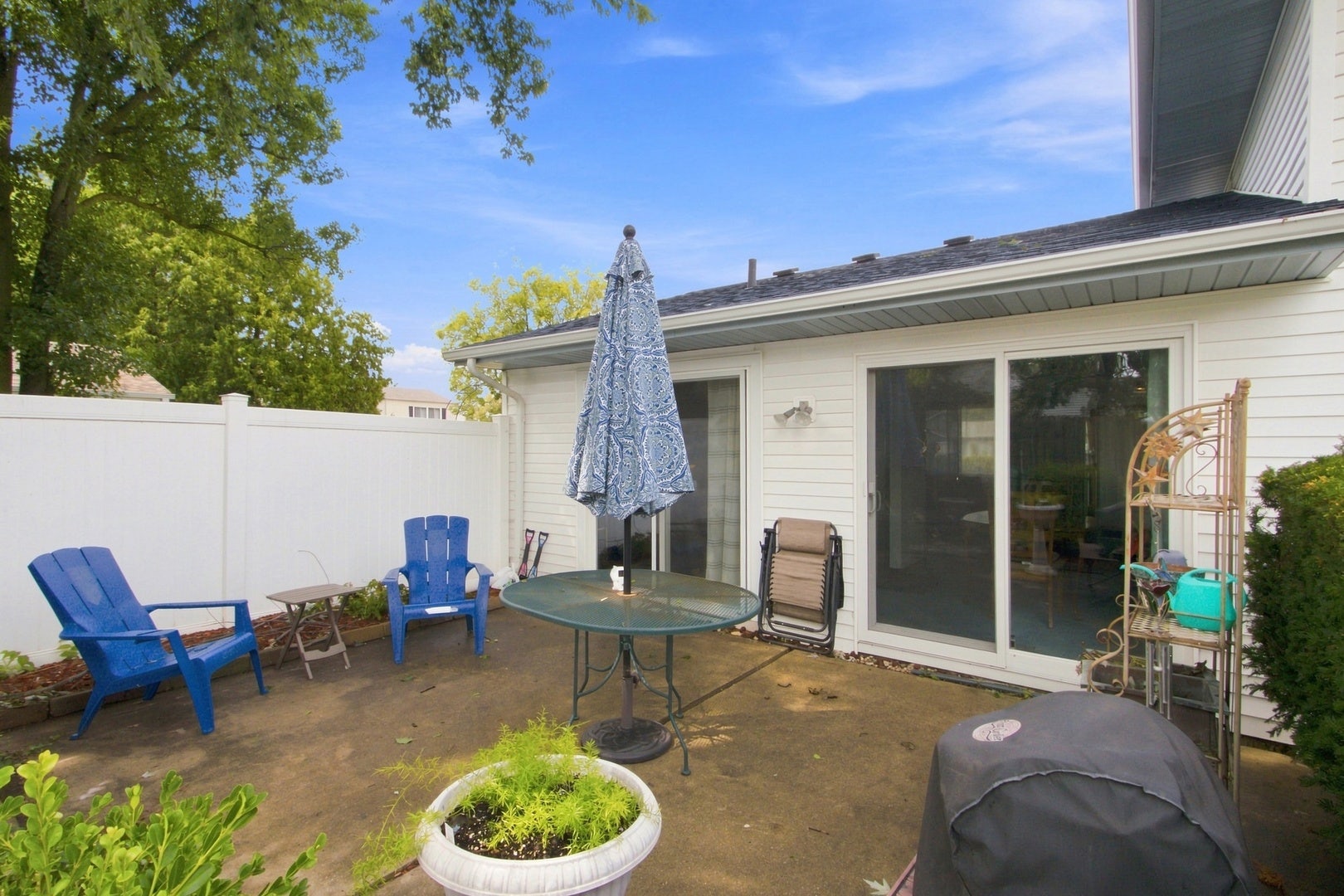 Large Cement Patio Overlooking Fully Fenced Back Y