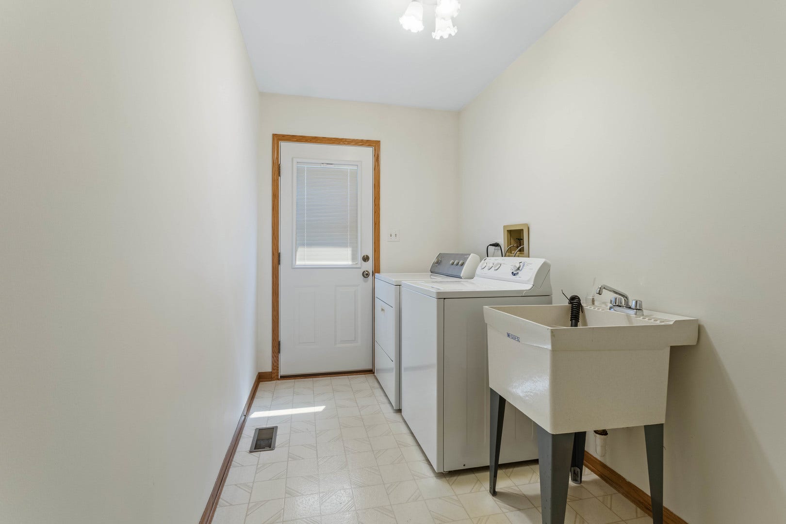 Located on the main level, this mud room doubles a