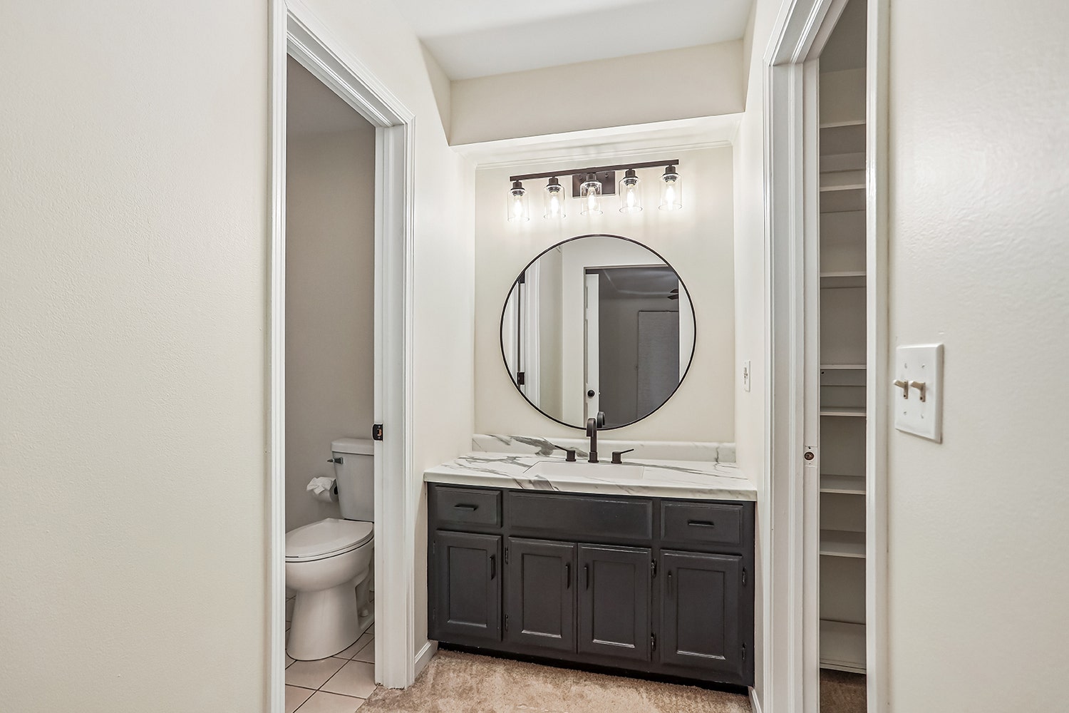 Master bathroom Vanity area:  Walk-in closet to ri