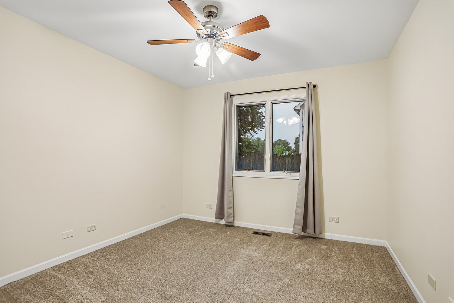 Bedroom #2-Main floor- Ceiling fans in both of the