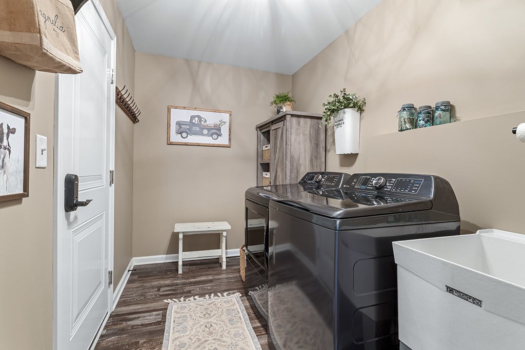 The Laundry room provides access to the garage.