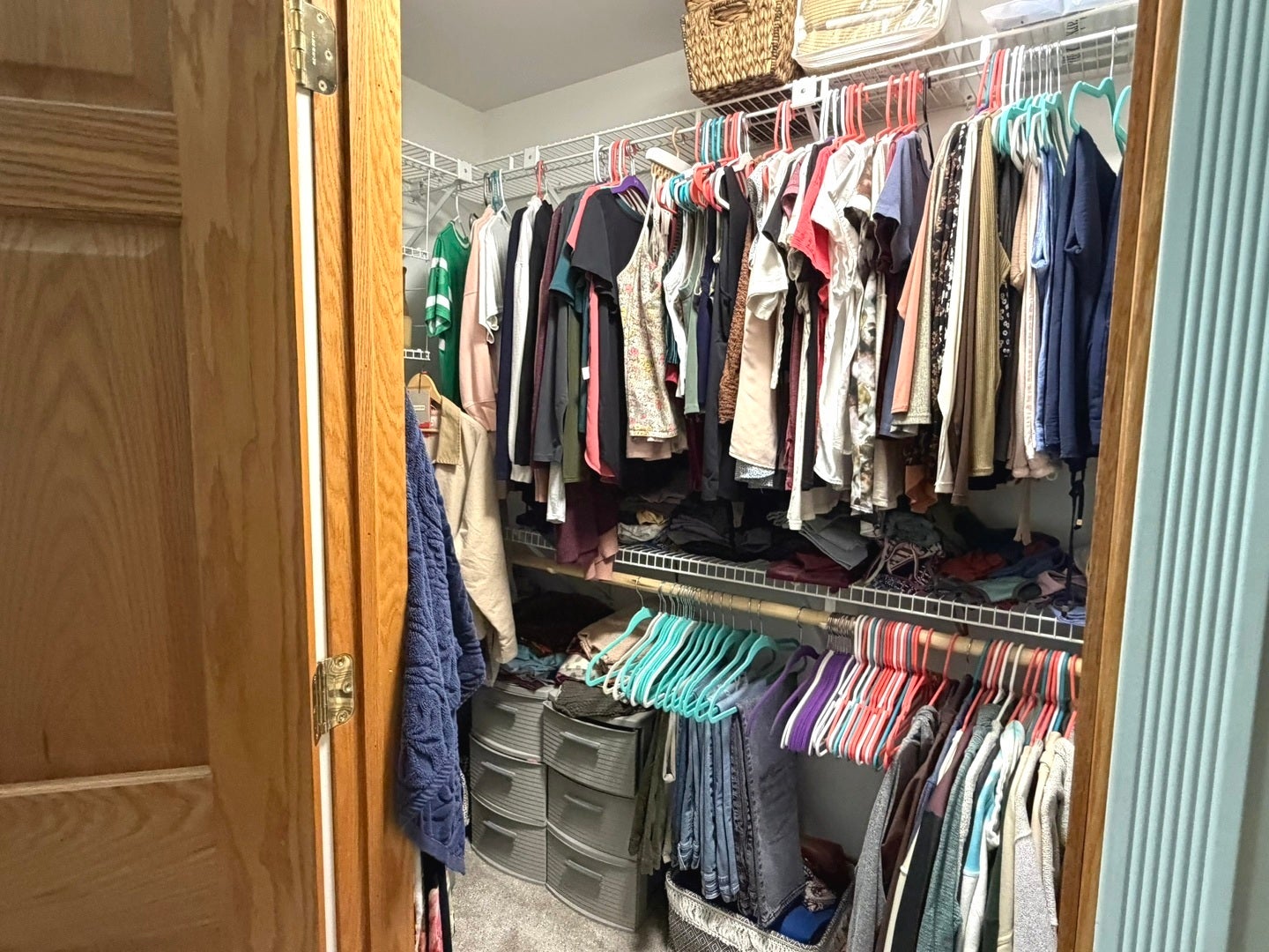 360 Homewood Drive, Bolingbrook, IL 60440 Large walk-in closet with a wood panel door.