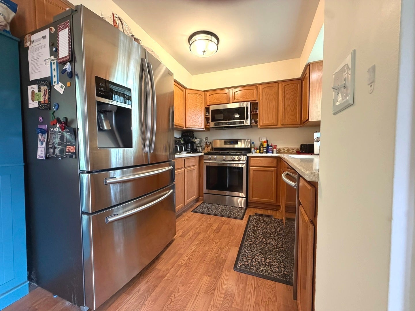 360 Homewood Drive, Bolingbrook, IL 60440 SS appliances, a new modern light, wood laminate f