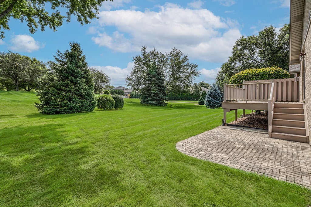 NICE MAINTENANCE FREE DECK IN BACK W/NO NEIGHBORS