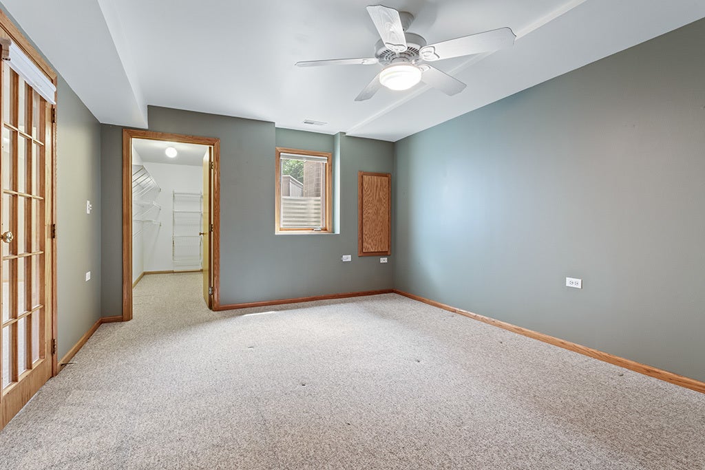 BEDROOM #3 IN THE BASEMENT W/DOUBLE DOOR ENTRY AND