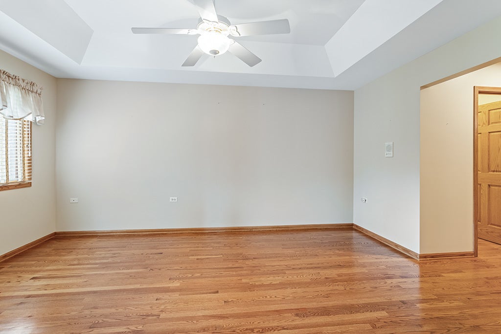 MASTER BEDROOM HAS COFFERED CEILING, HARDWOOD FLOO