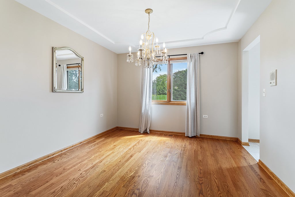 DINING ROOM W/HARDWOOD FLOORS