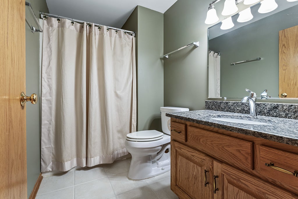 BASEMENT 3/4 BATH W/GRANITE TOPS