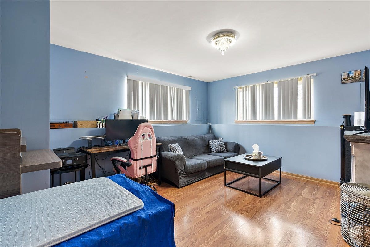 2941 Woodside Drive, Joliet, IL 60431 Basement family room with updated paint and lighti