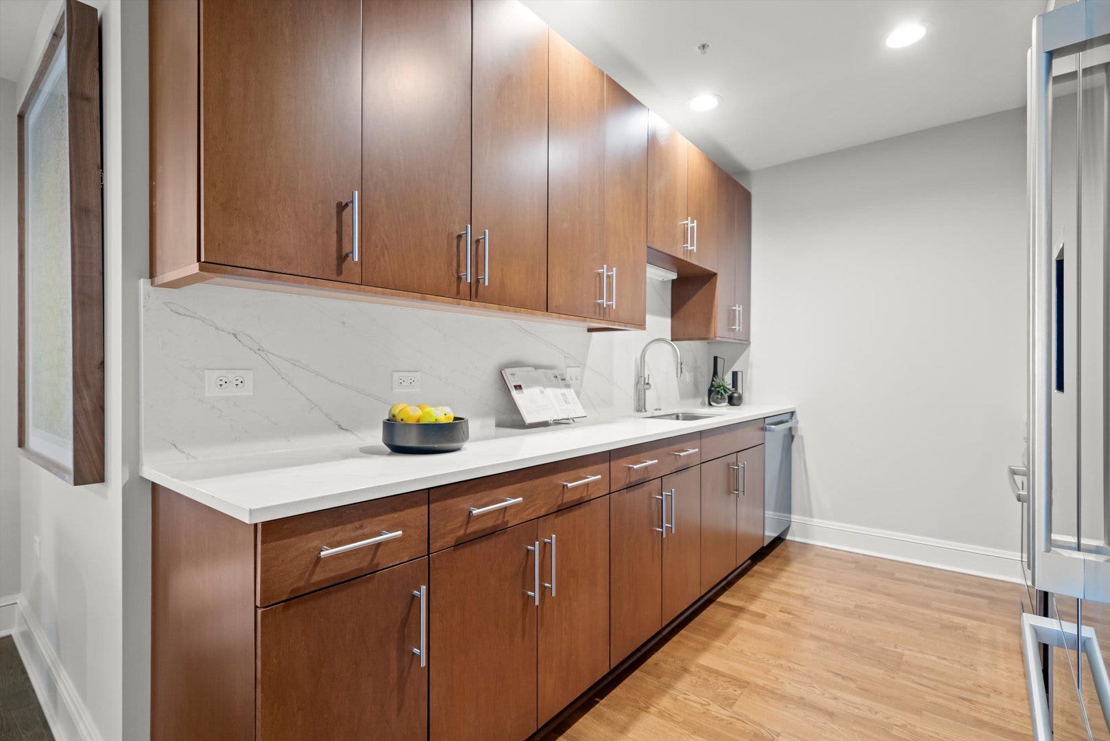**Photo is of a different model residence, represe