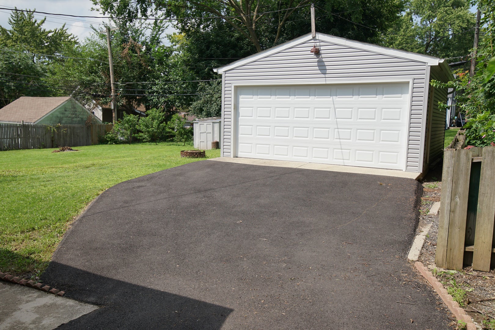 2.5 Car Garage and New driveway.