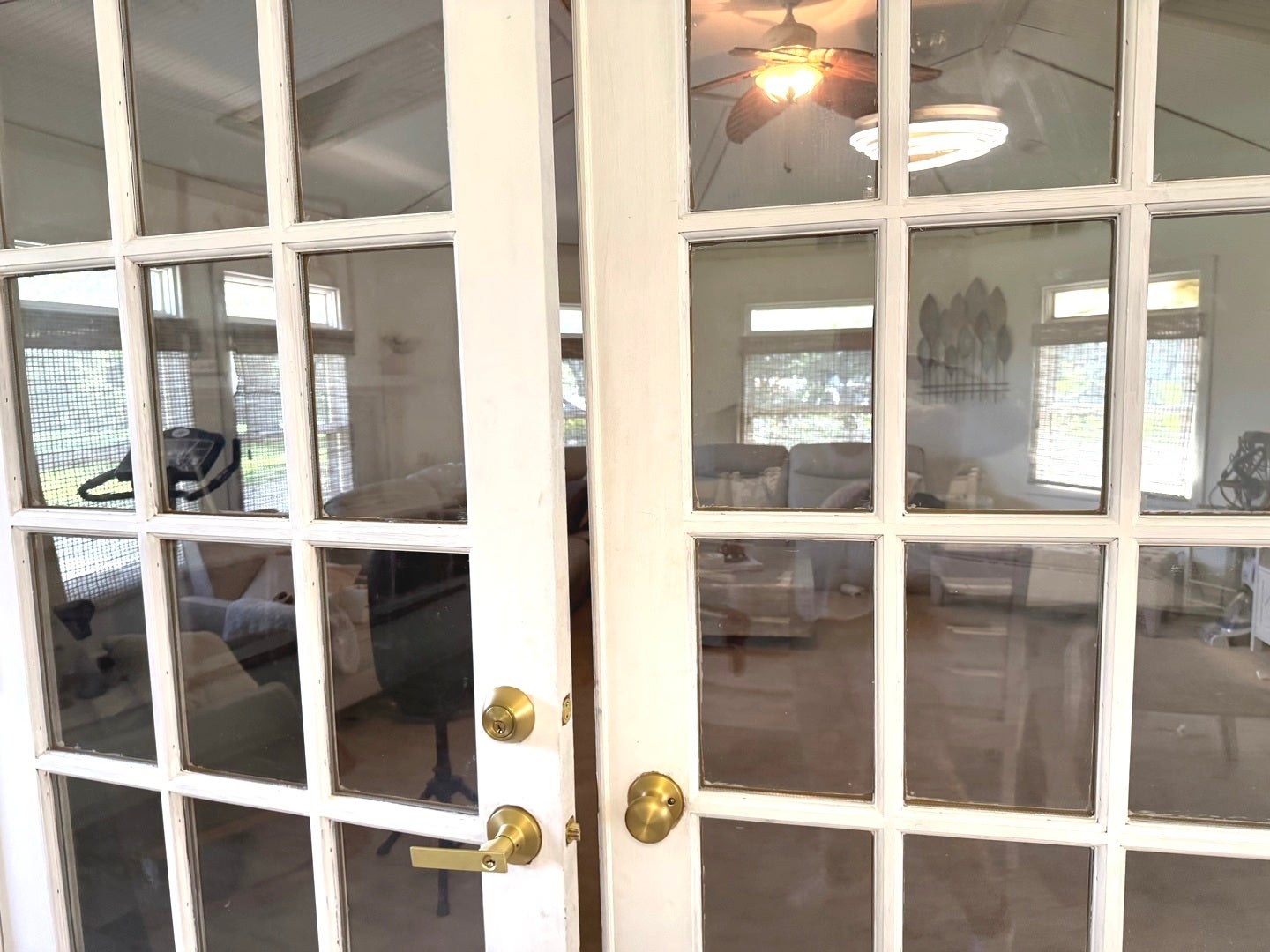 French stores that lead to the sunroom addition