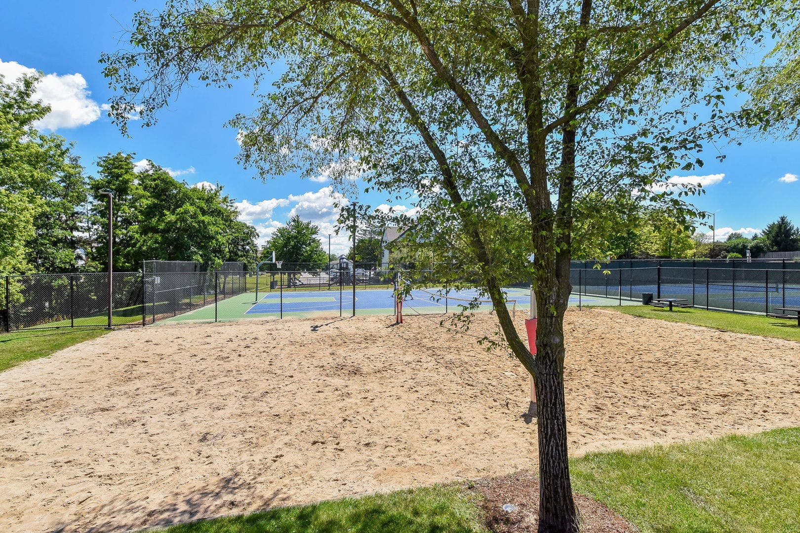 417 Saratoga Drive, Aurora, IL 60502 Sand volleyball with basketball court in the backg