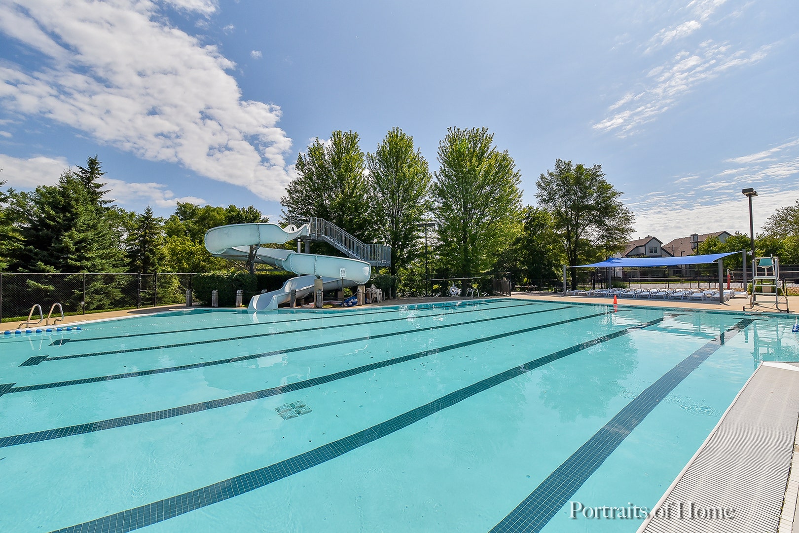 417 Saratoga Drive, Aurora, IL 60502 Community pool lane lines looking across to the sl