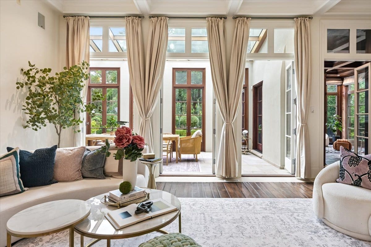 Fabulous Living Room with High Ceilings Opens into