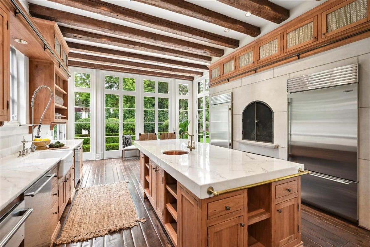 The kitchen is extremely large with an area for an