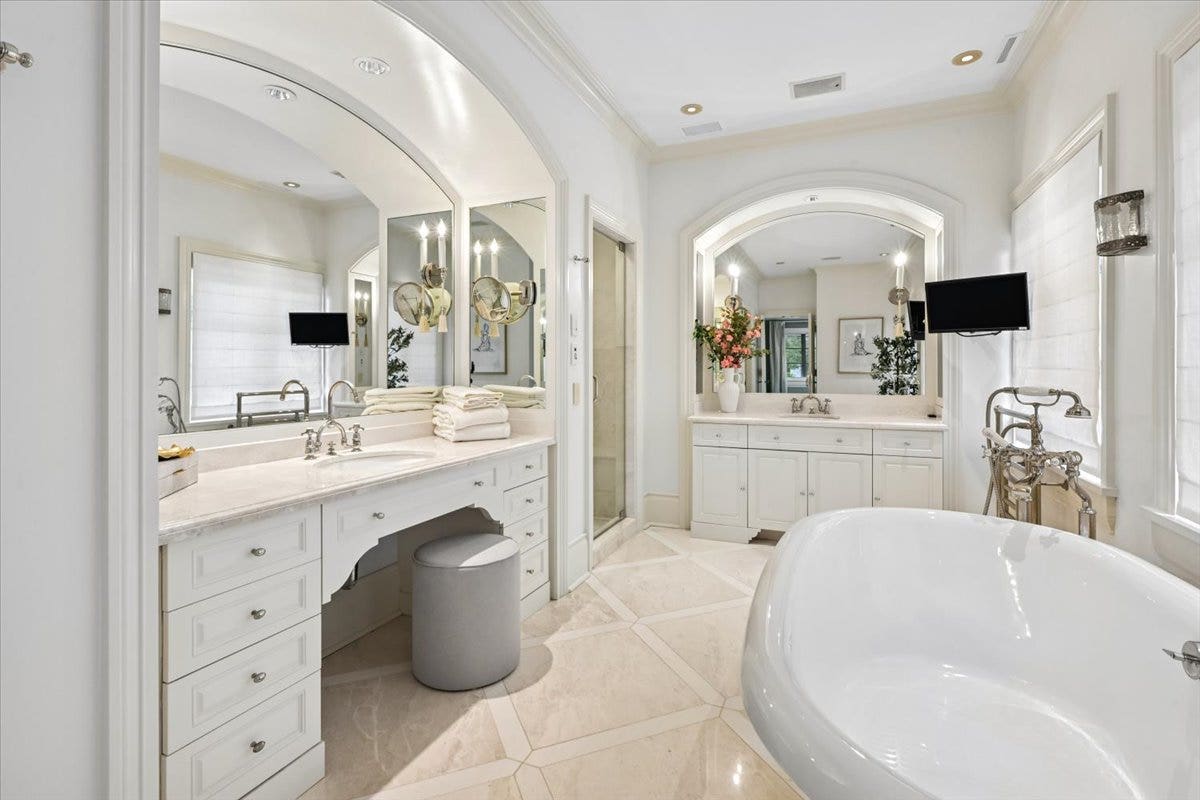 A Spa retreat with separate vanities, a lovely soa