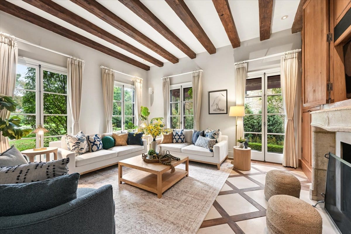 Floor to ceiling windows bring the outdoors into t