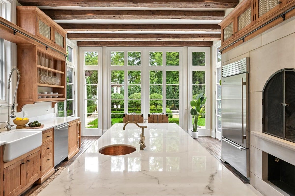 A Gourmet Kitchen in every way that overlooks the