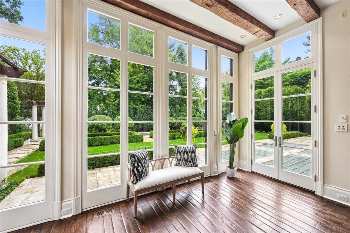 A kitchen with a serene view. Step out to the priv