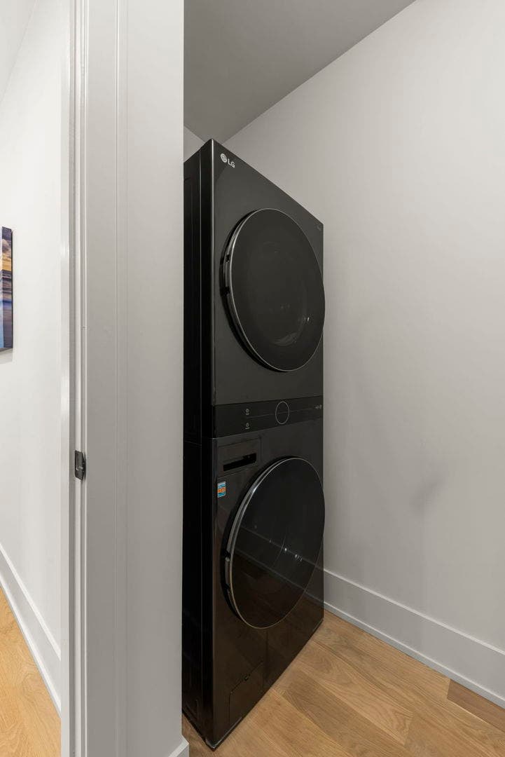 Laundry room in primary bedroom closet. (1 of 2 La
