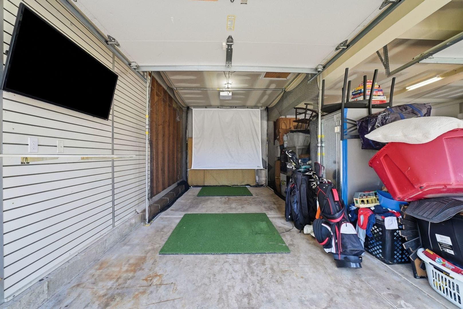 2213 Roaring Creek Drive, Aurora, IL 60503 SkyTrak golf simulator w/ impact screen, hitting m