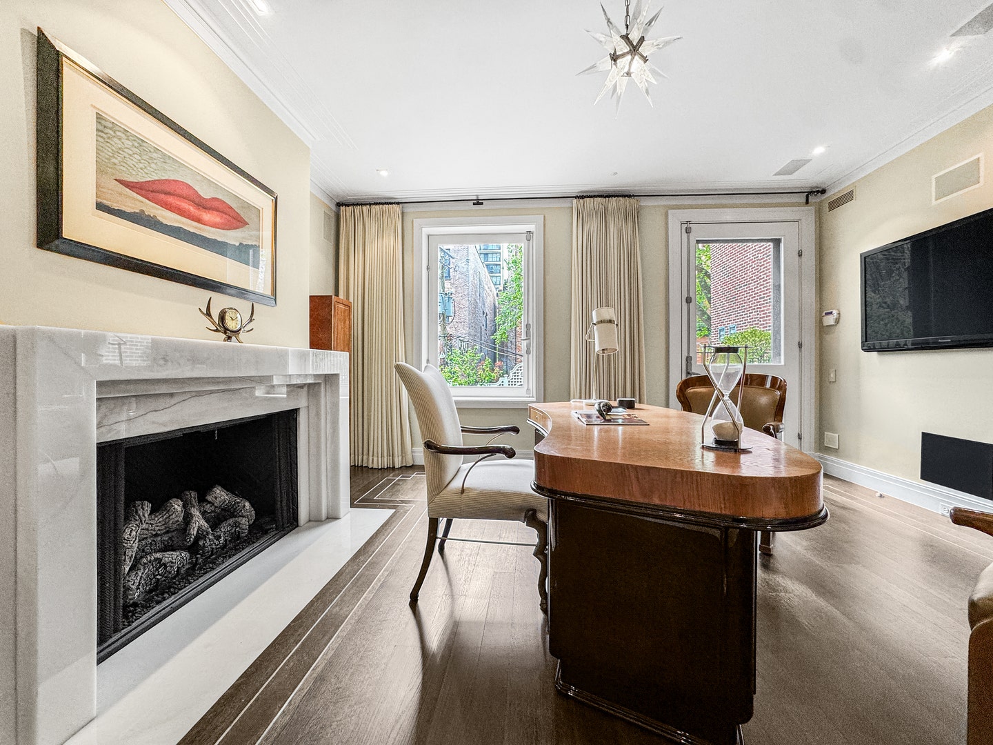 1524 N Astor Street, Chicago, IL 60610 The office/den includes a fireplace with a white o