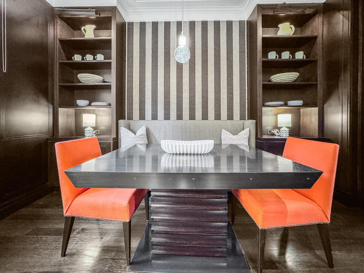 1524 N Astor Street, Chicago, IL 60610 The banquette includes a custom table on a swivel