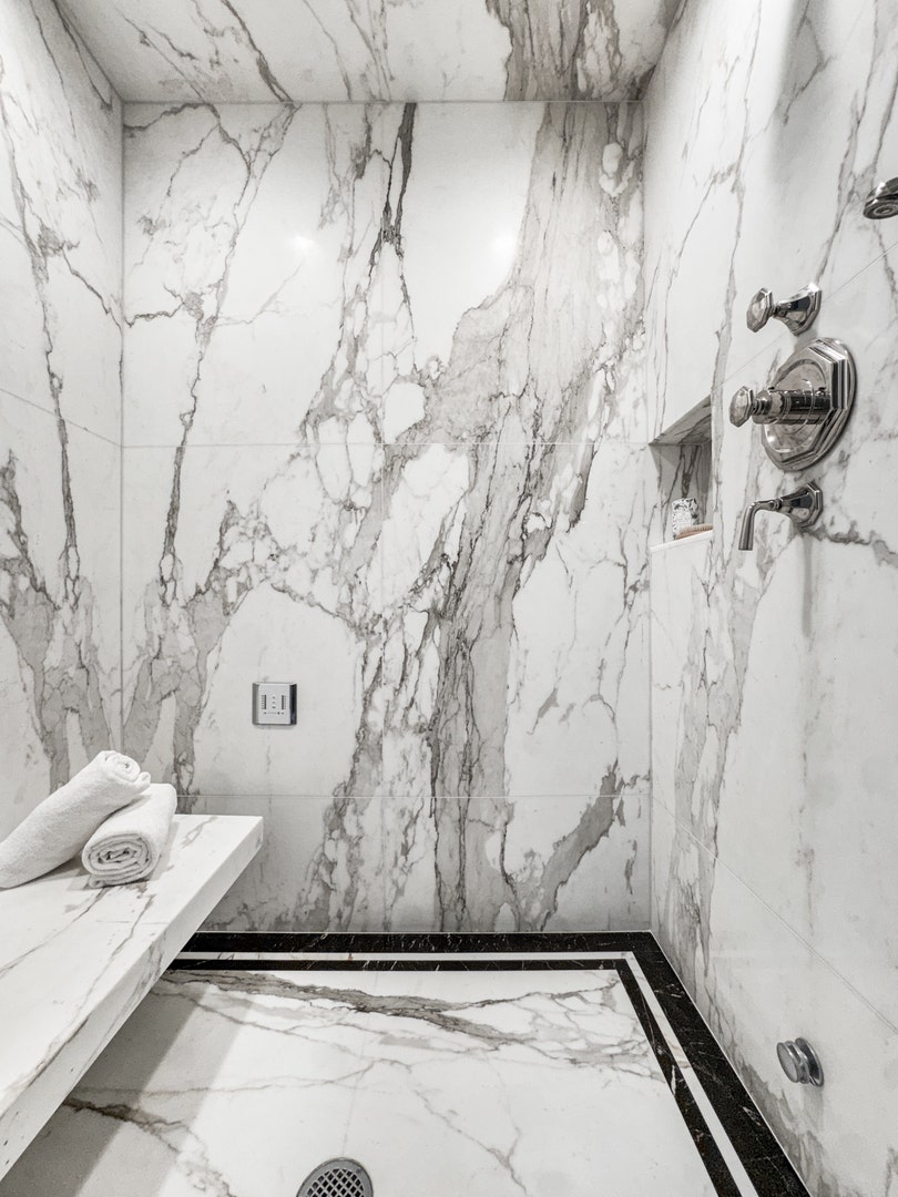 1524 N Astor Street, Chicago, IL 60610 The steam shower has bookmatched marble slab walls