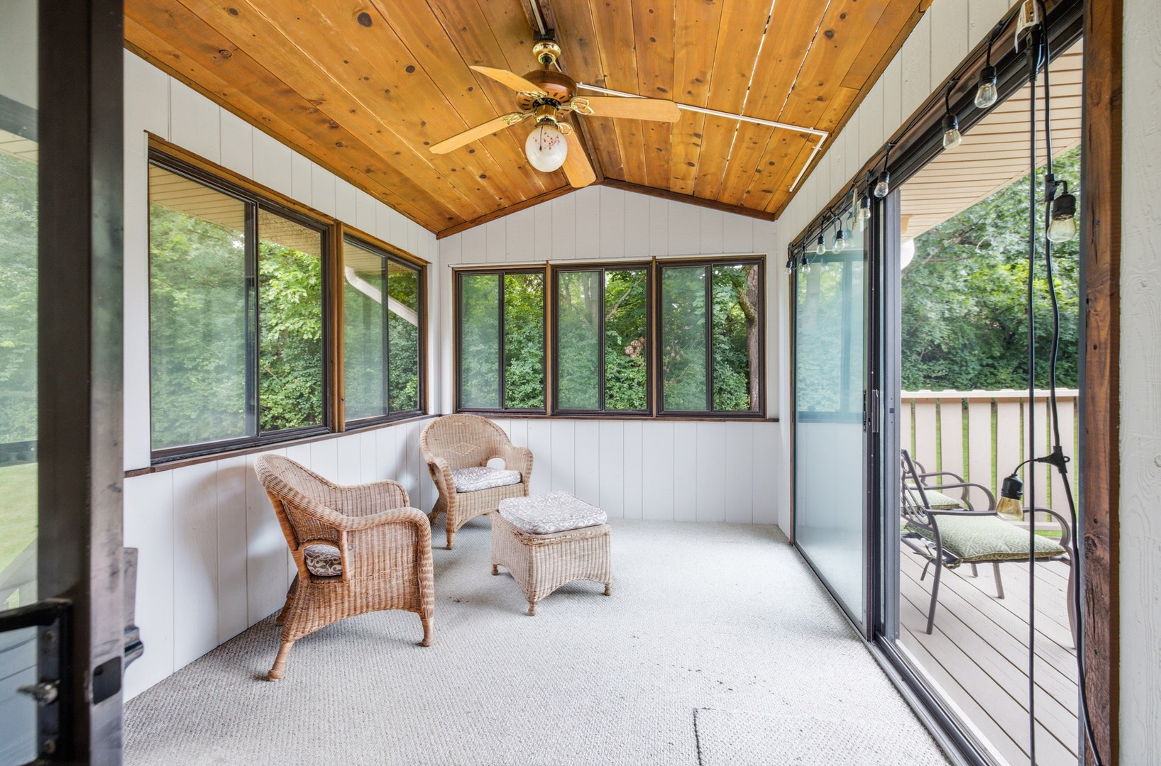 off of the kitchen with access to the deck