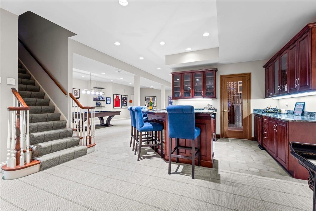 Fully finished, high ceiling basement with custom
