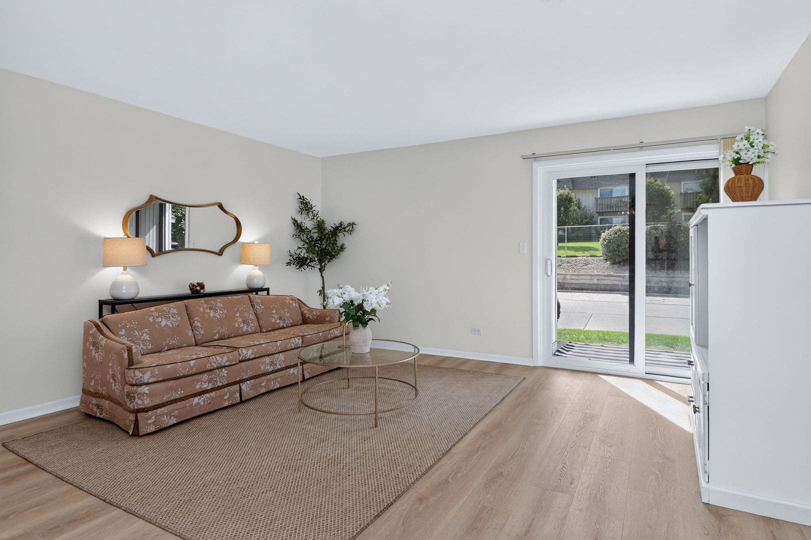 7353 Blackburn Avenue, #K106, Downers Grove, IL 60516 Living room with new Slider and all new floors