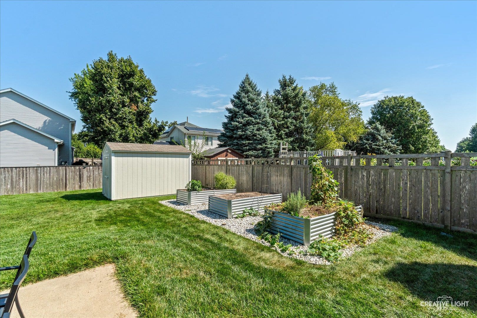 52 Blackberry Trail, Aurora, IL 60506 Large corner lot with 32x22 concrete patio and fan
