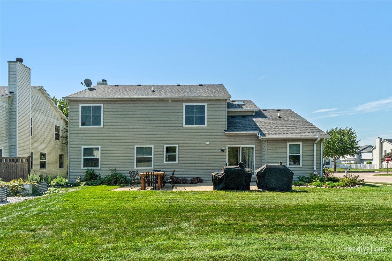 52 Blackberry Trail, Aurora, IL 60506 Large corner lot with 32x22 concrete patio and fan