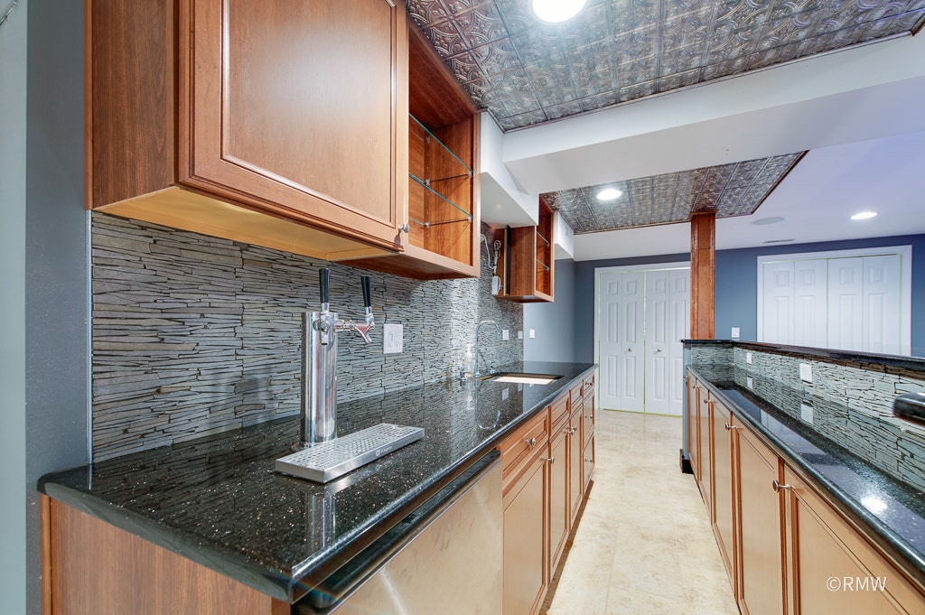 Granite counter tops with kegerator and sink