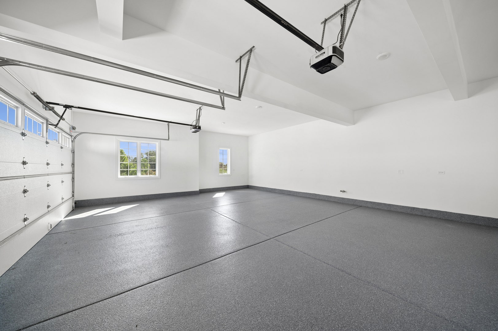 3 Attached Garage with epoxy floor that rises appr