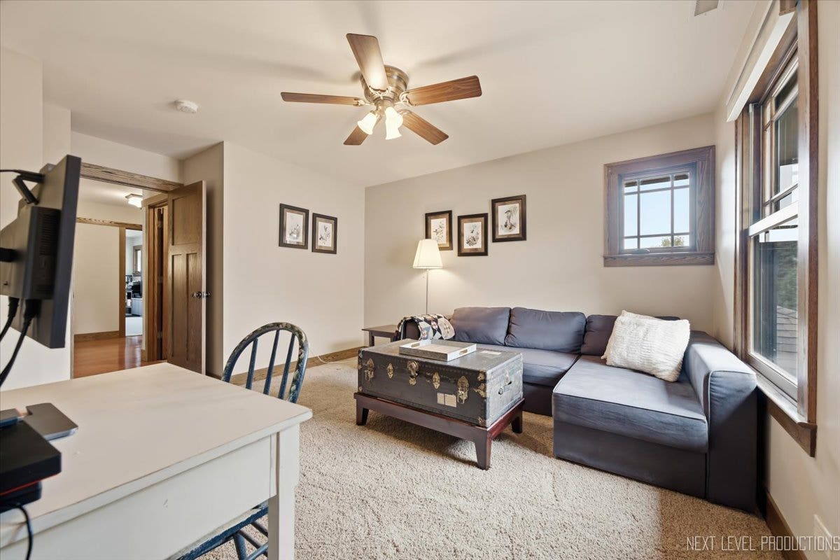 627 Ritter Drive, Batavia, IL 60510 4th Bedroom shown with sofa and desk