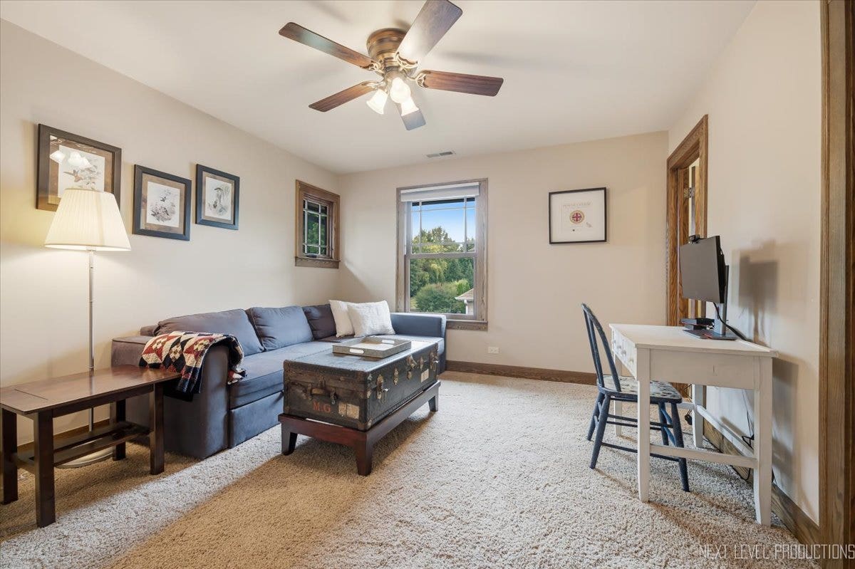 627 Ritter Drive, Batavia, IL 60510 4th Bedroom shown with sofa and desk