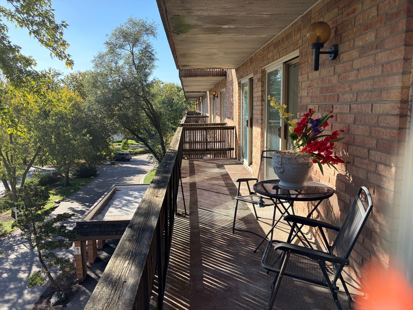 OPPOSITE VIEW OF THE LARGE BALCONY