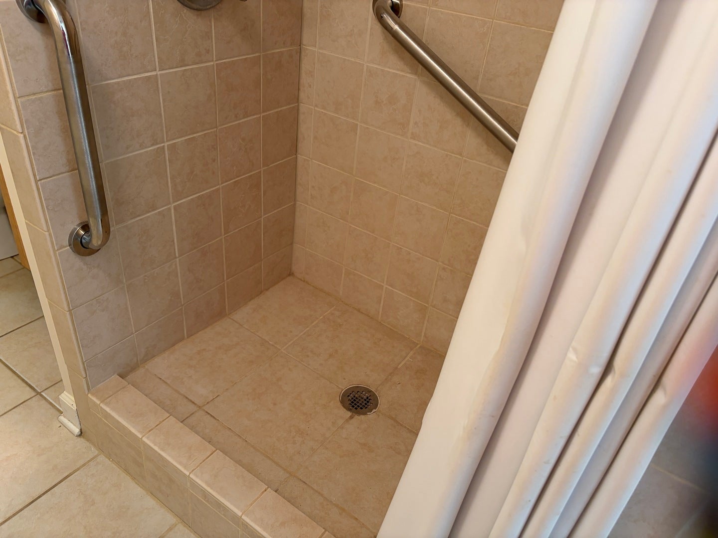 NOTE THE SMALL STEP FOR THE SHOWER
