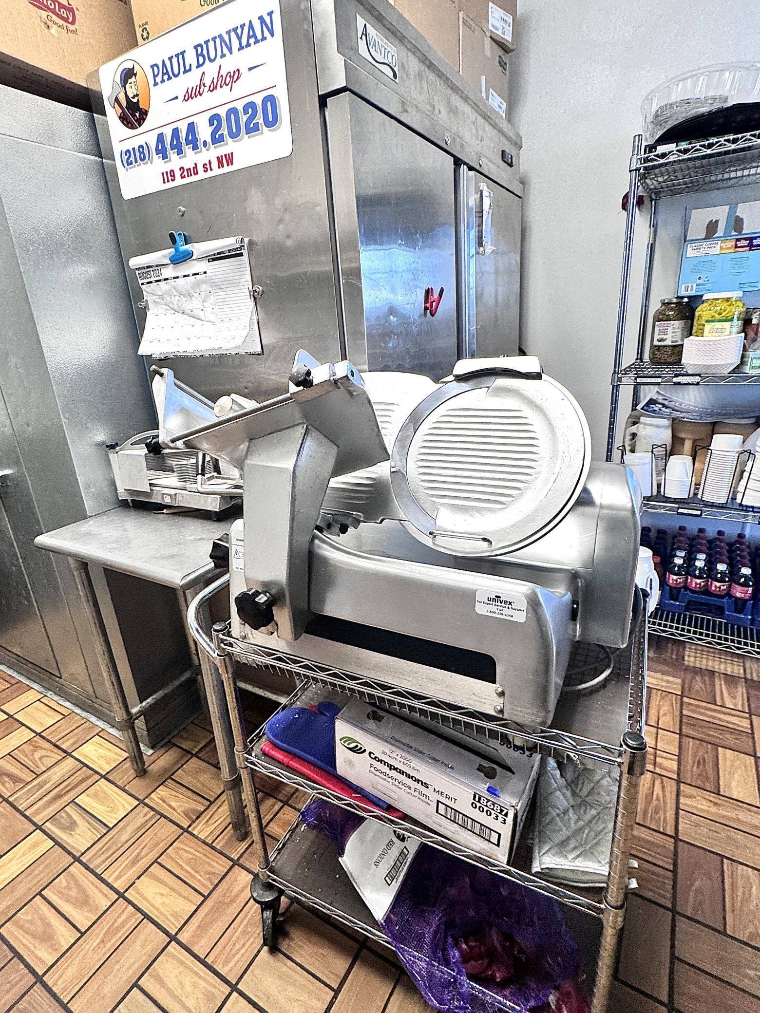 119 2nd Street NW, Bemidji, MN 56601 Meat slicer for cutting fresh deli meat for the sandwiches.